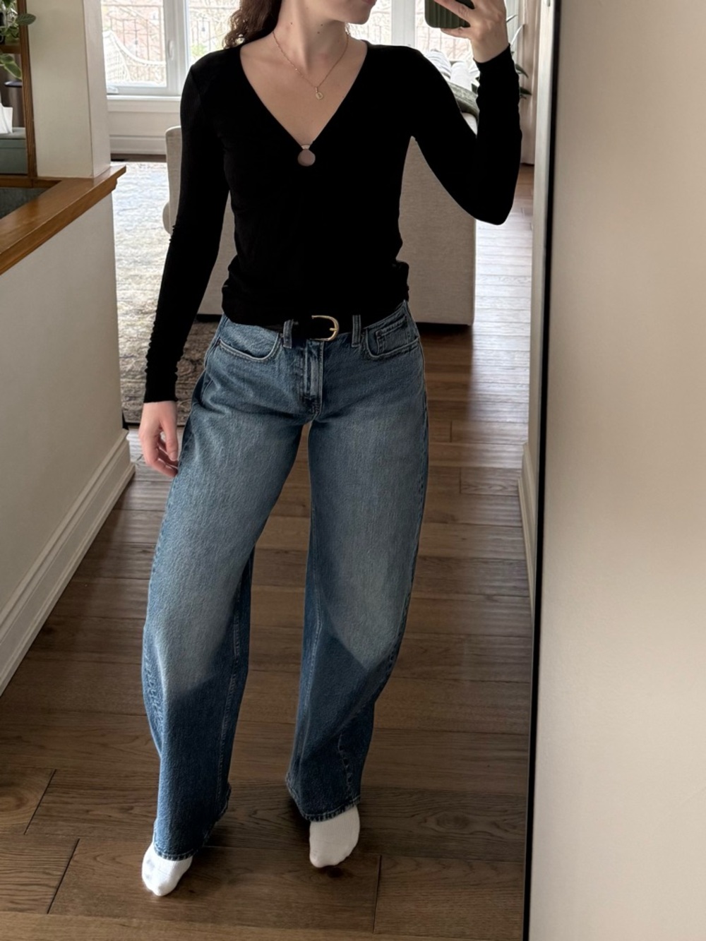Black ribbed long sleeved top with ring detail